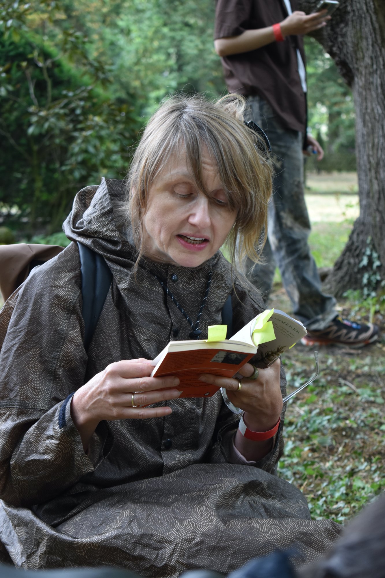 a person reads from a book