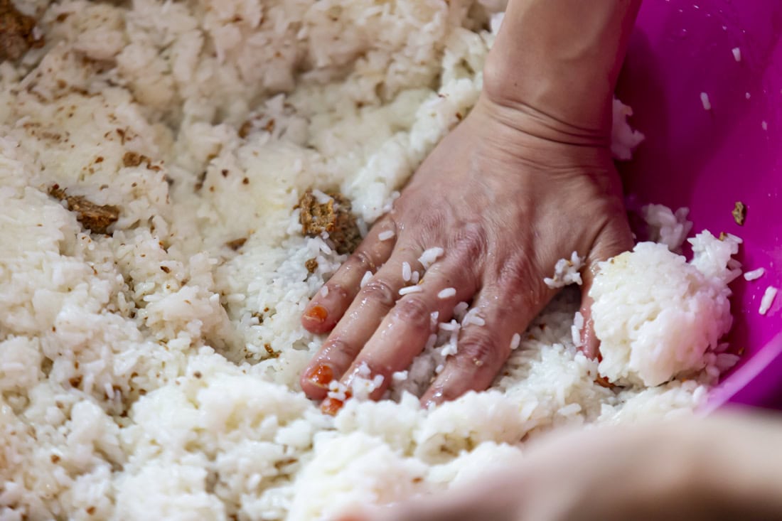 hands kneeding dough