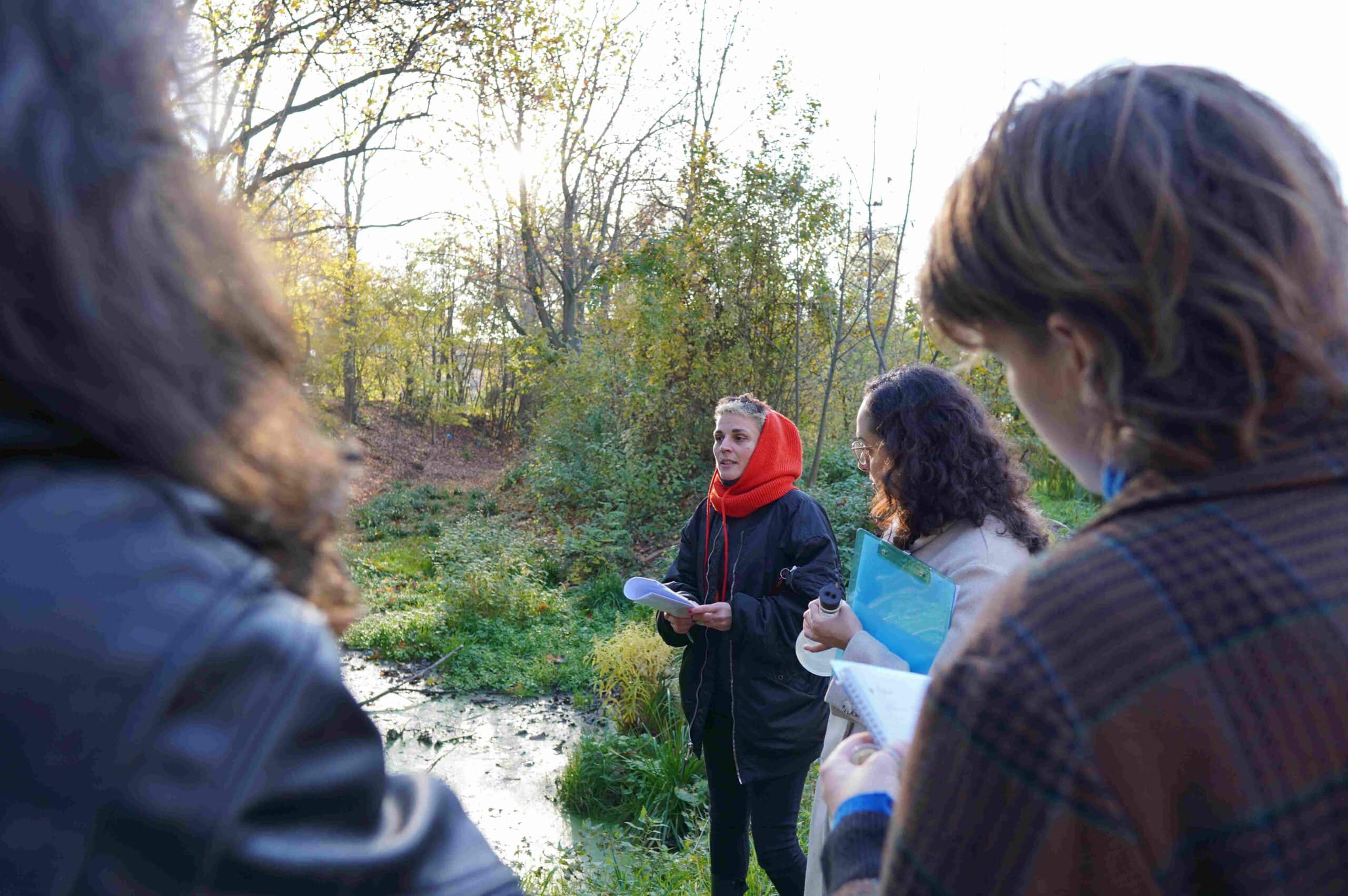 Fara Peluso talking to a group of people