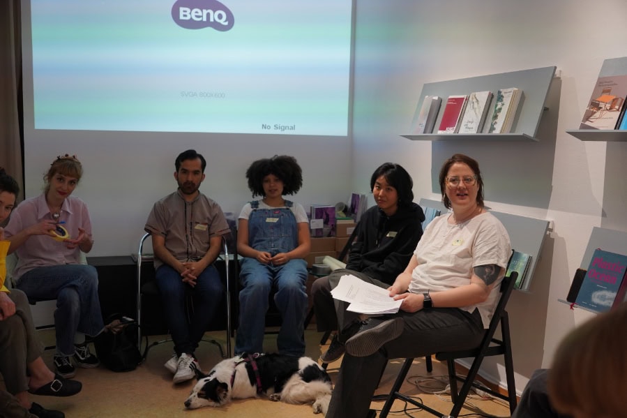 Elizabeth presenting to a group of people