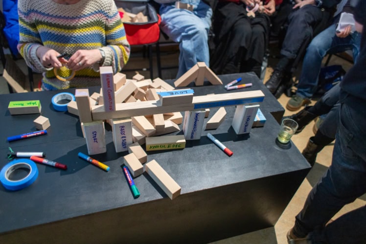A sculpture built of wooden blocks